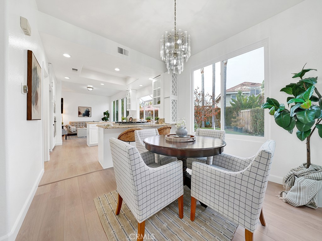 13814 Apache Tustin, CA 92782 - Photo 8 of 45 a living room with furniture and a chandelier