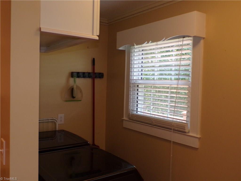 2525 Nebo Road Boonville, NC 27011 - Photo 7 of 30 Laundry area also has a built-in ironing board