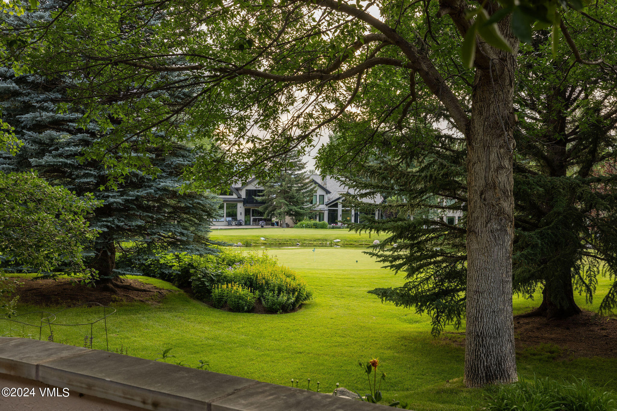 91 Ambleside Place Edwards, CO 81632 - Photo 23 of 28 a view of a lake with houses