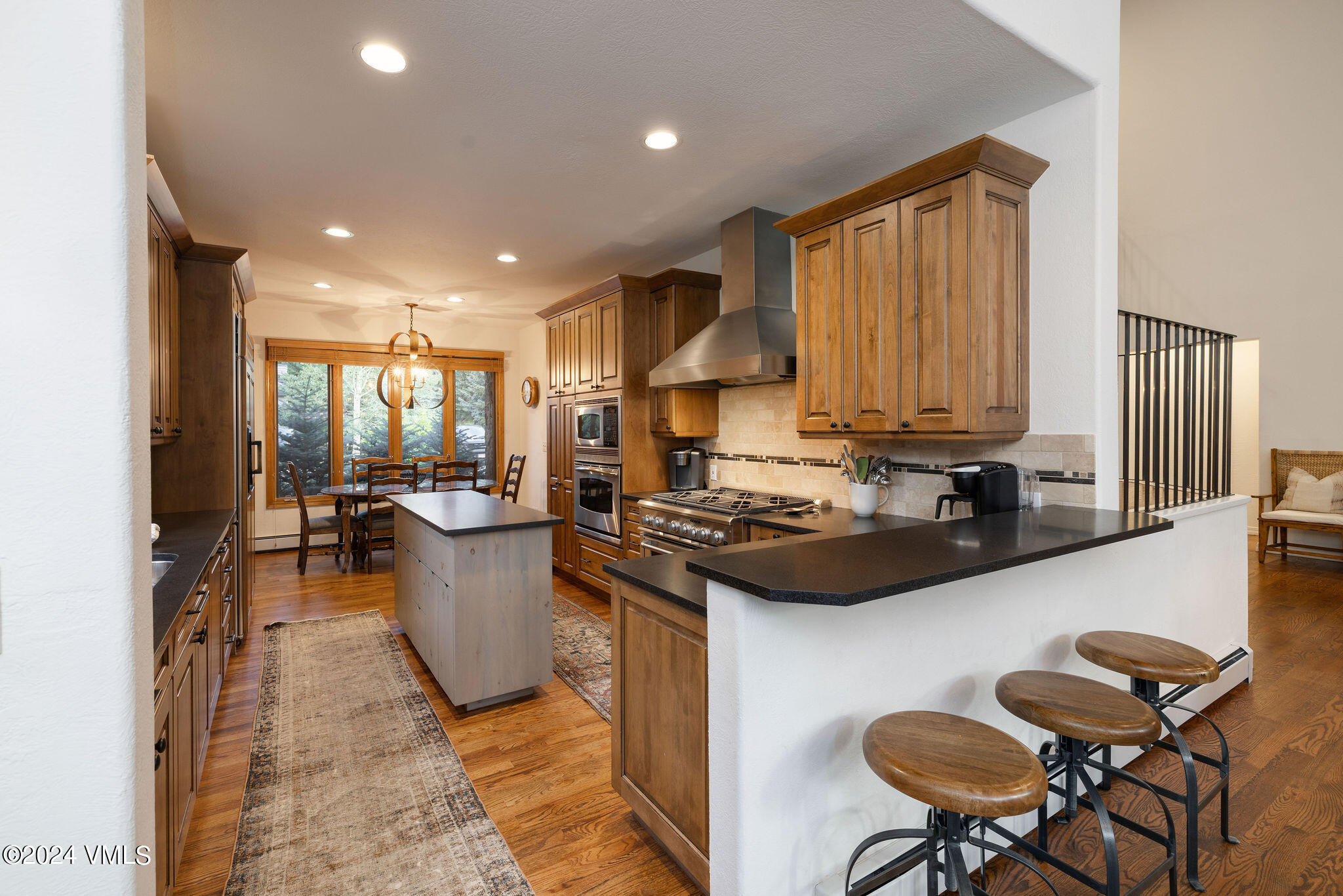 91 Ambleside Place Edwards, CO 81632 - Photo 6 of 28 a kitchen with a sink and cabinets