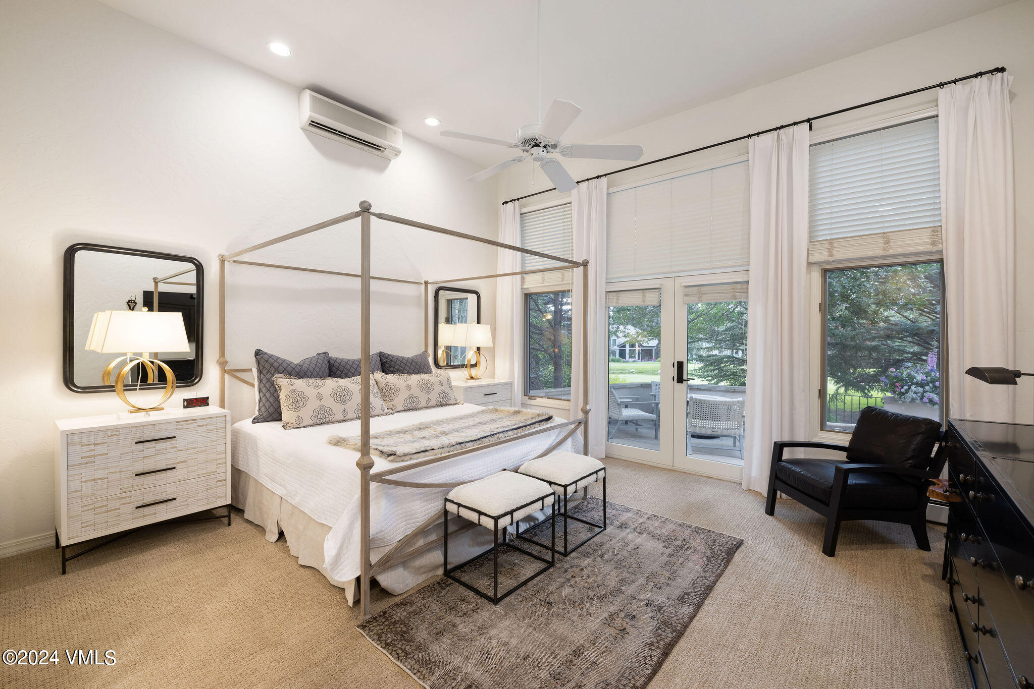 91 Ambleside Place Edwards, CO 81632 - Photo 8 of 28 a bedroom with a bed and a large window