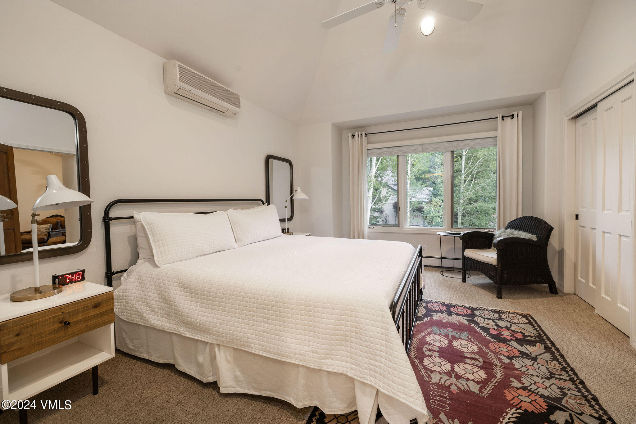 91 Ambleside Place Edwards, CO 81632 - Photo 9 of 28 a bed room with a bed and a chair