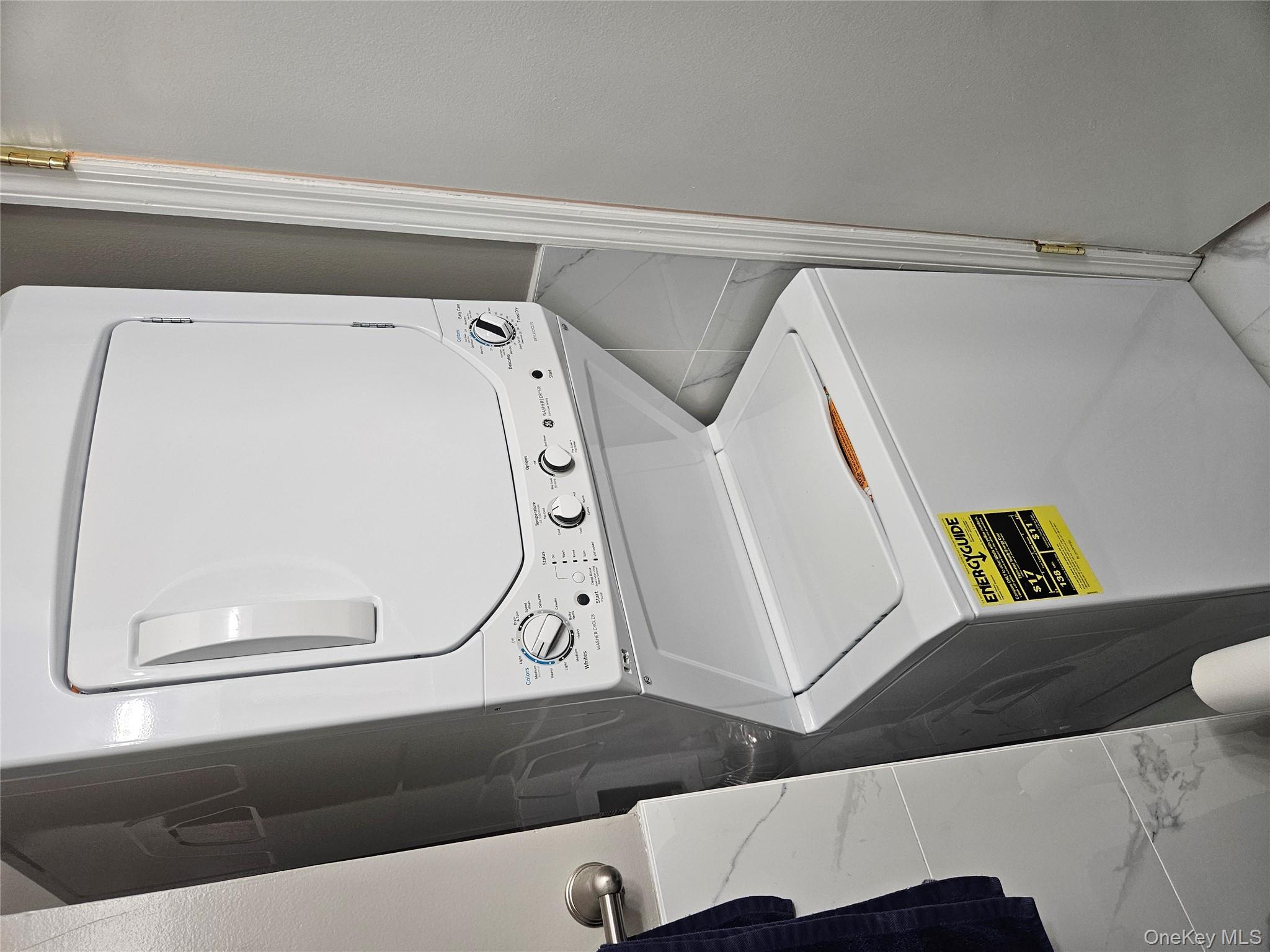 20 Lexington Hills Road, Unit 10 Harriman, NY 10926 - Photo 17 of 17 Laundry area with stacked washing maching and dryer