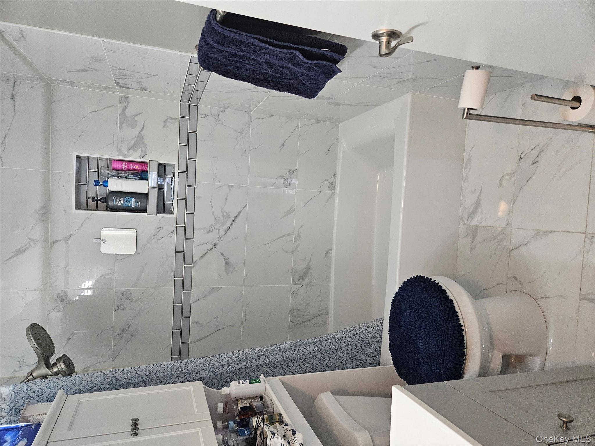 20 Lexington Hills Road, Unit 10 Harriman, NY 10926 - Photo 6 of 17 Full bathroom with vanity, toilet, and shower / bathtub combination with curtain