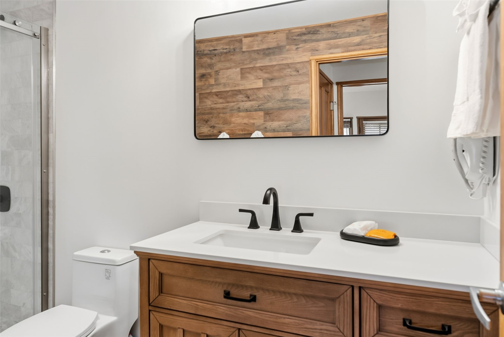 195 River Run Road, Unit 8015 Keystone, CO 80435 - Photo 20 of 35 a bathroom with a sink a mirror and a toilet