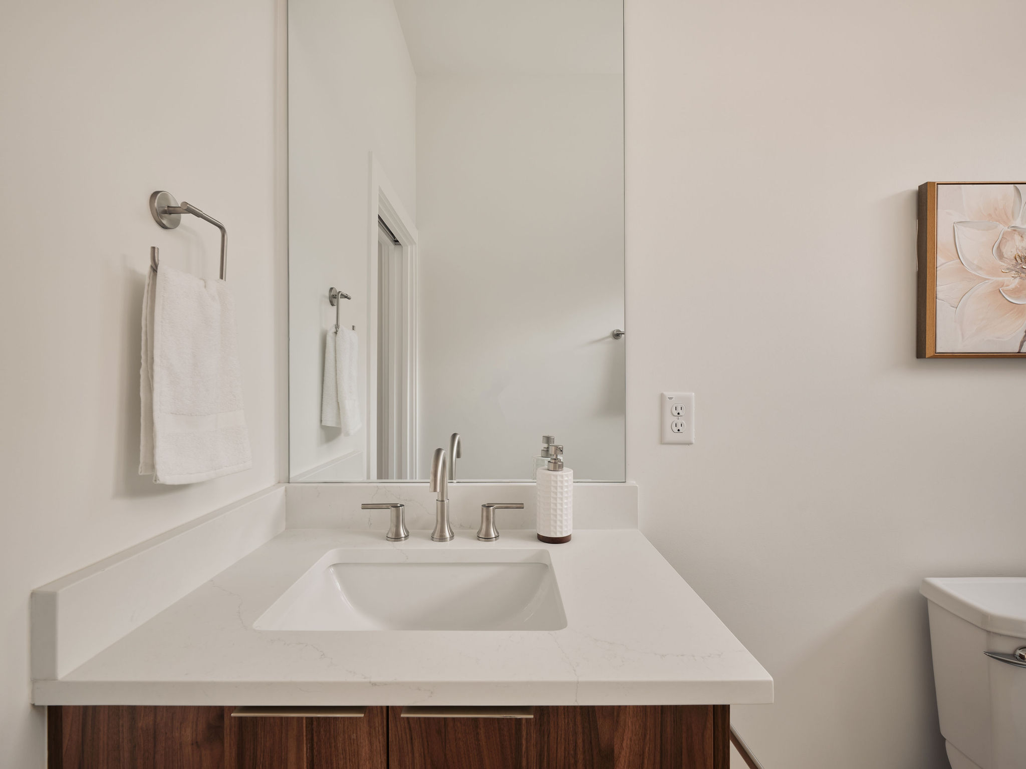 1215 Fort Branch Boulevard, Unit 2 Austin, TX 78721 - Photo 12 of 23 a bathroom with a sink and a mirror