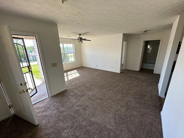 an empty room with windows