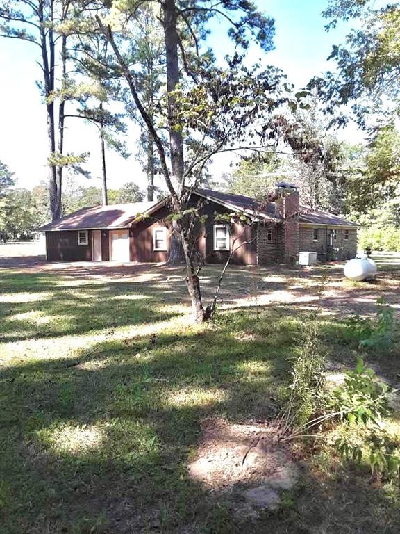 10495 Fm 346 Street West Flint, TX 75762 - Photo 2 of 19 a view of a yard in front of the house