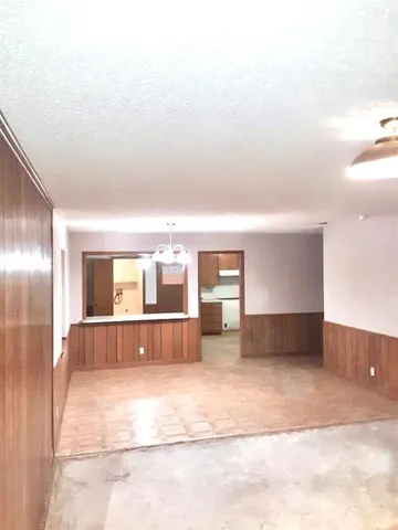 a view of empty room with windows