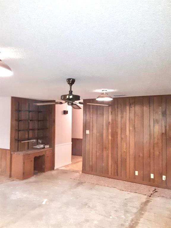 10495 Fm 346 Street West Flint, TX 75762 - Photo 8 of 19 an empty room with wooden floor and windows