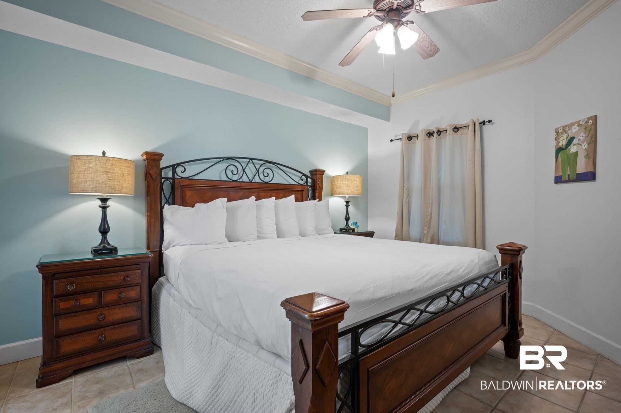 27580 Canal Road, Unit 1427 Orange Beach, AL 36561 - Photo 22 of 38 Bedroom with ornamental molding, a ceiling fan, and light tile patterned floors