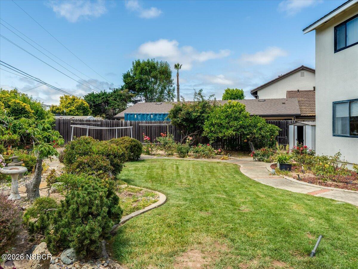 360 Tallyho Road Santa Maria, CA 93455 - Photo 50 of 72 a view of a house with swimming pool and a chairs