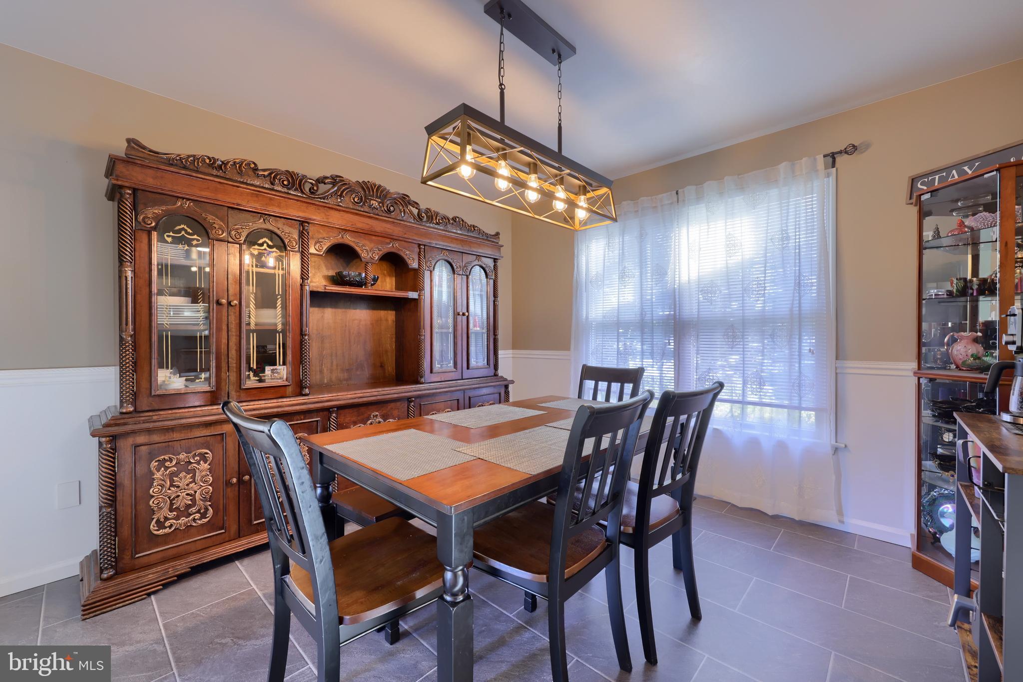 1022 Boeshore Circle Reading, PA 19605 - Photo 12 of 39 a dining room with furniture and window