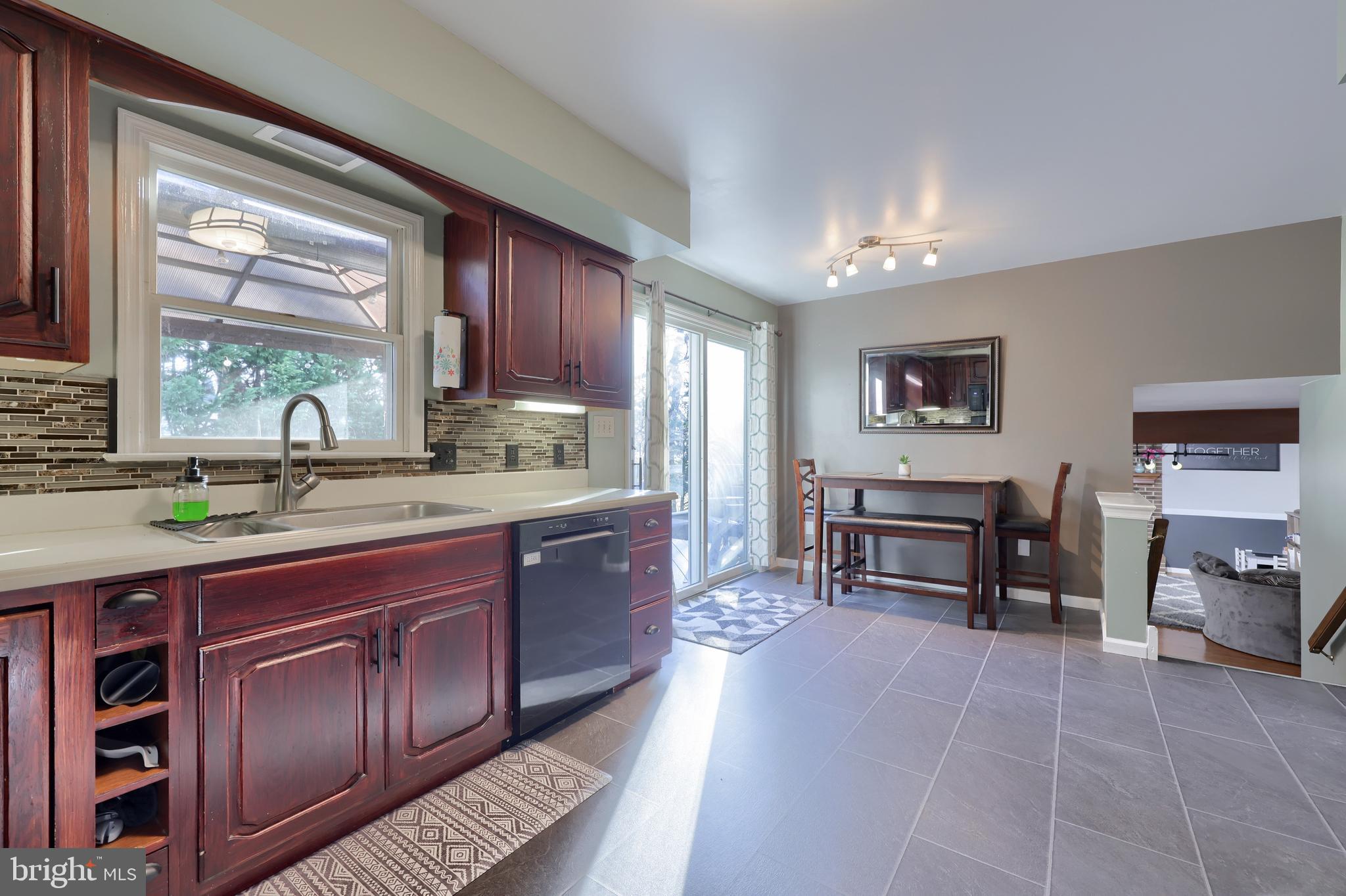 1022 Boeshore Circle Reading, PA 19605 - Photo 14 of 39 a kitchen with granite countertop a sink cabinets and appliances