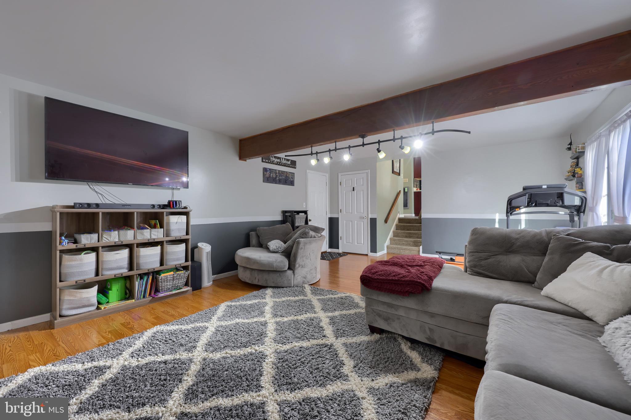 1022 Boeshore Circle Reading, PA 19605 - Photo 30 of 39 a living room with furniture and a rug
