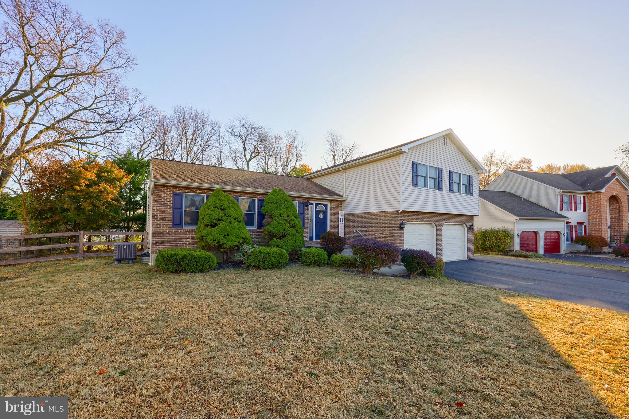 1022 Boeshore Circle Reading, PA 19605 - Photo 4 of 39 a view of a house with a big yard and large trees