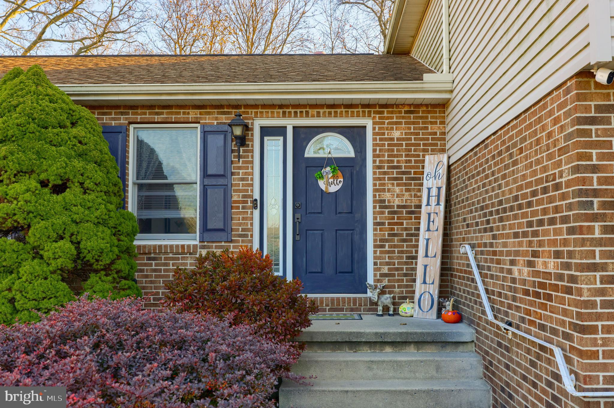 1022 Boeshore Circle Reading, PA 19605 - Photo 5 of 39 a front view of a house with a garden