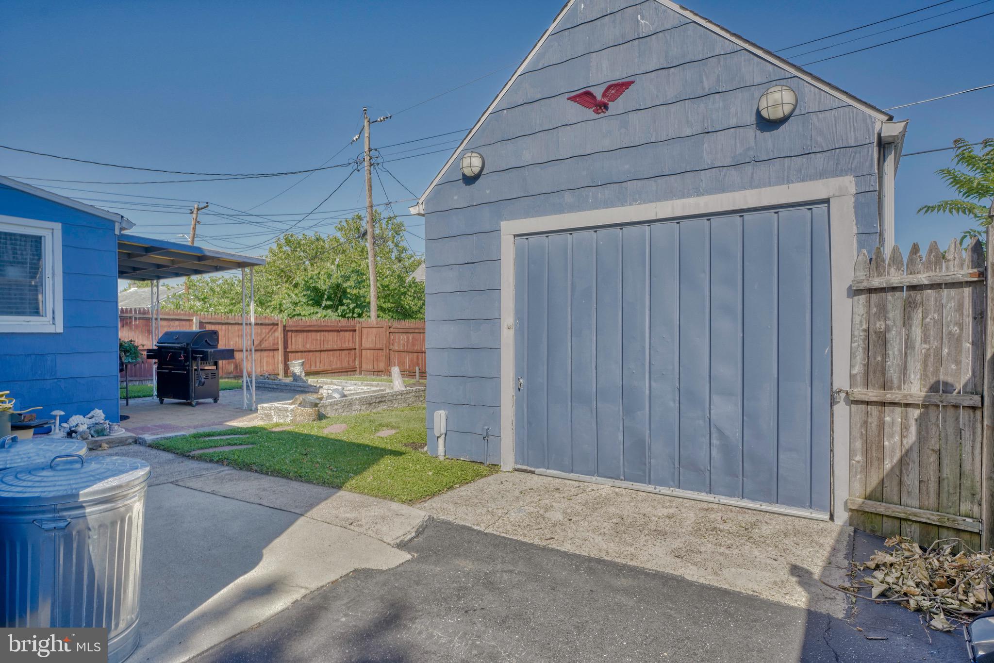 1903 Adams Road Baltimore, MD 21222 - Photo 23 of 29 a view of a house with a patio