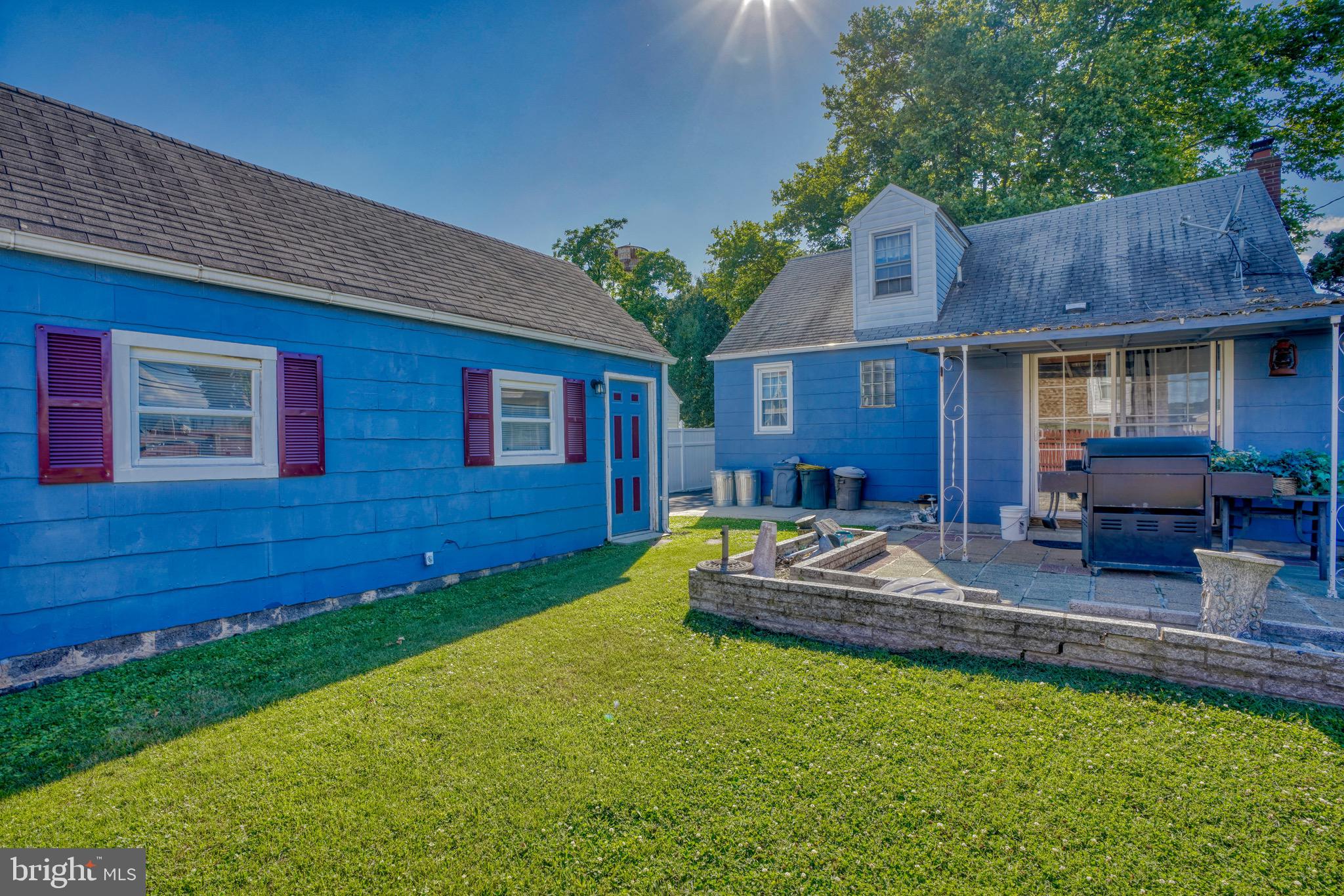 1903 Adams Road Baltimore, MD 21222 - Photo 24 of 29 a front view of house with yard and outdoor seating