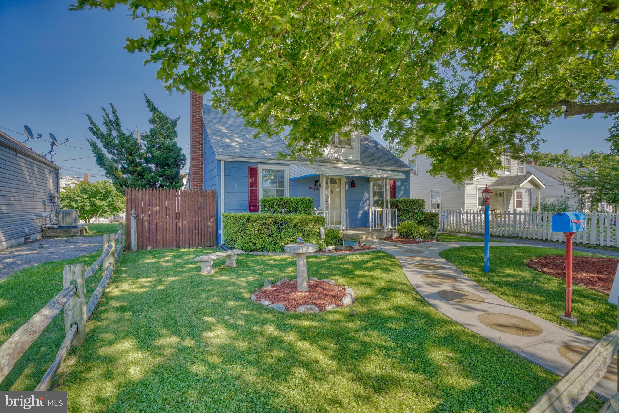 1903 Adams Road Baltimore, MD 21222 - Photo 4 of 29 a view of a house with a yard and tree s