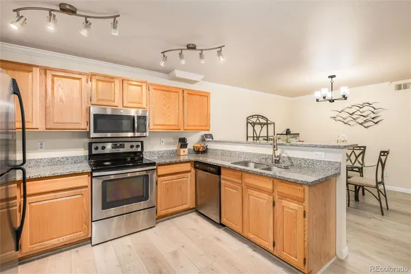 $299,900 | 12304 West Cross Drive, Unit 103, Littleton, CO 80127