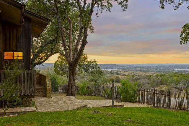 a view of a garden with mountain