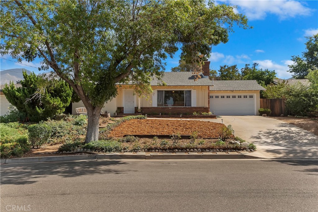 35525 Rodeo Road Yucaipa, CA 92399 - Photo 1 of 1 a front view of a house with a yard