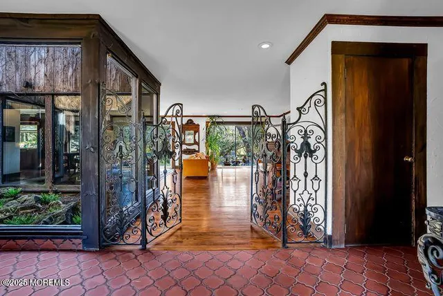 a view of livingroom with furniture and hardwood floor
