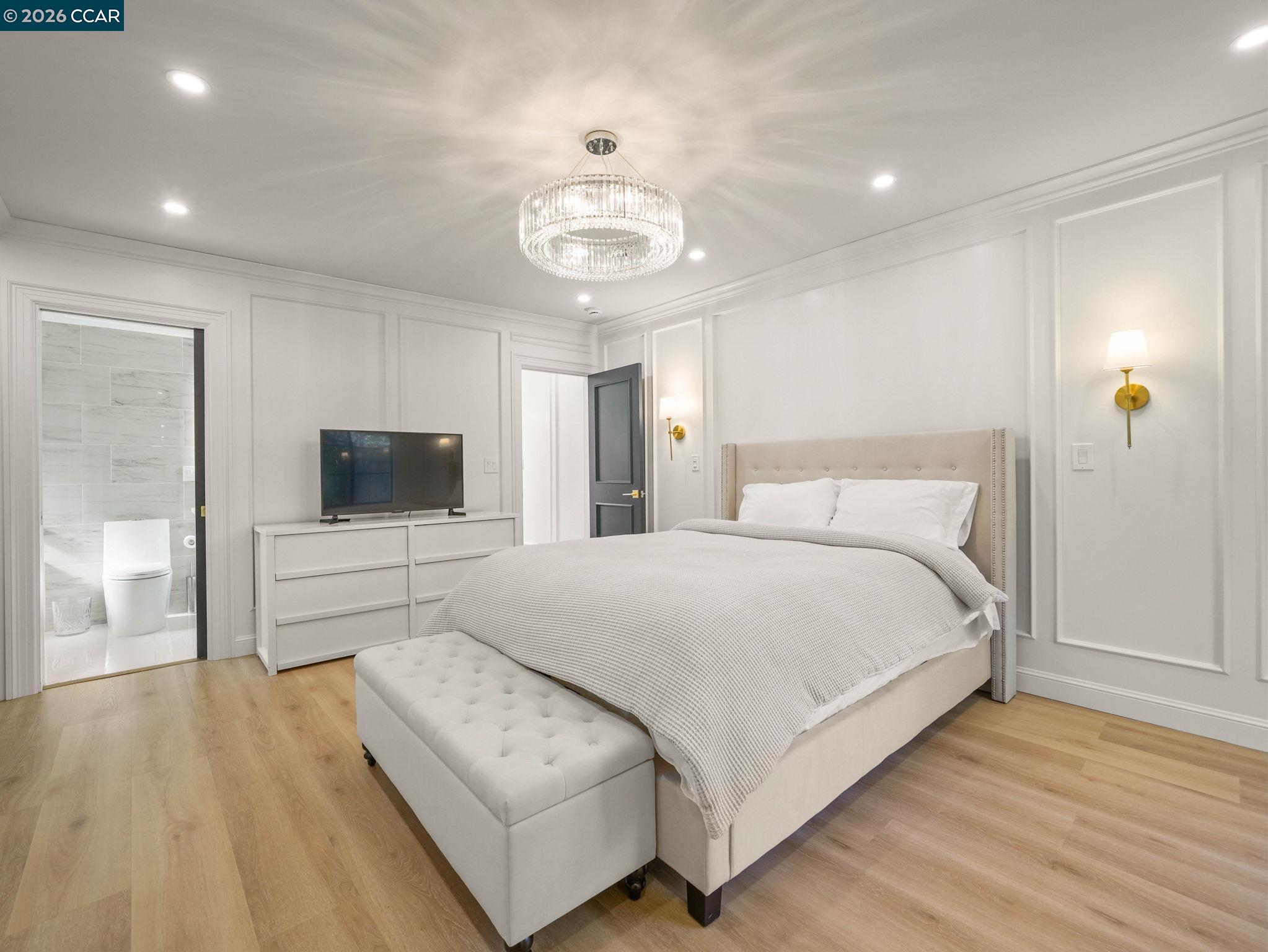 1622 San Luis Road Walnut Creek, CA 94597 - Photo 16 of 29 a bedroom with a bed and a flat screen tv