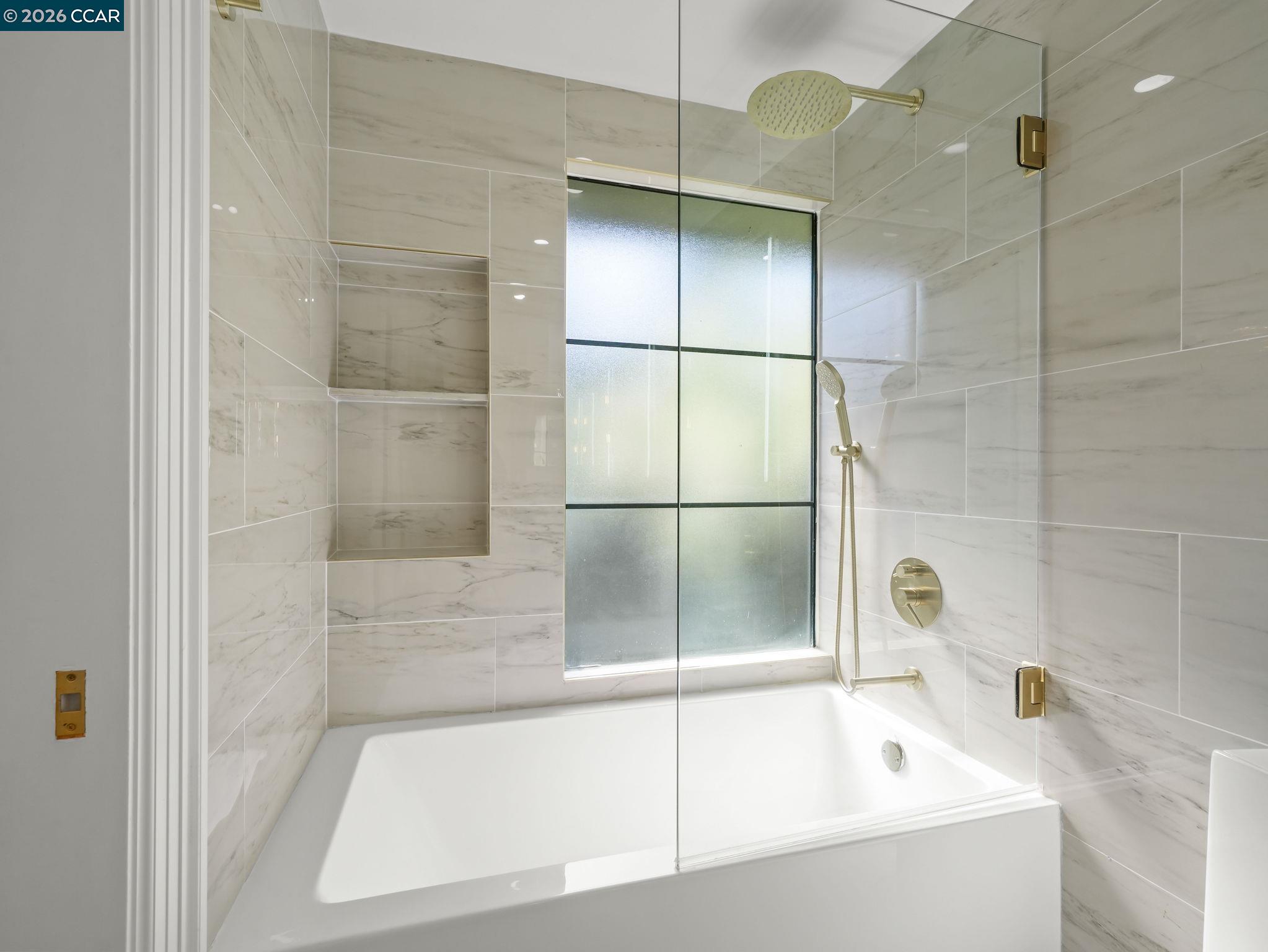 1622 San Luis Road Walnut Creek, CA 94597 - Photo 20 of 29 a bathroom with a bathtub and a shower