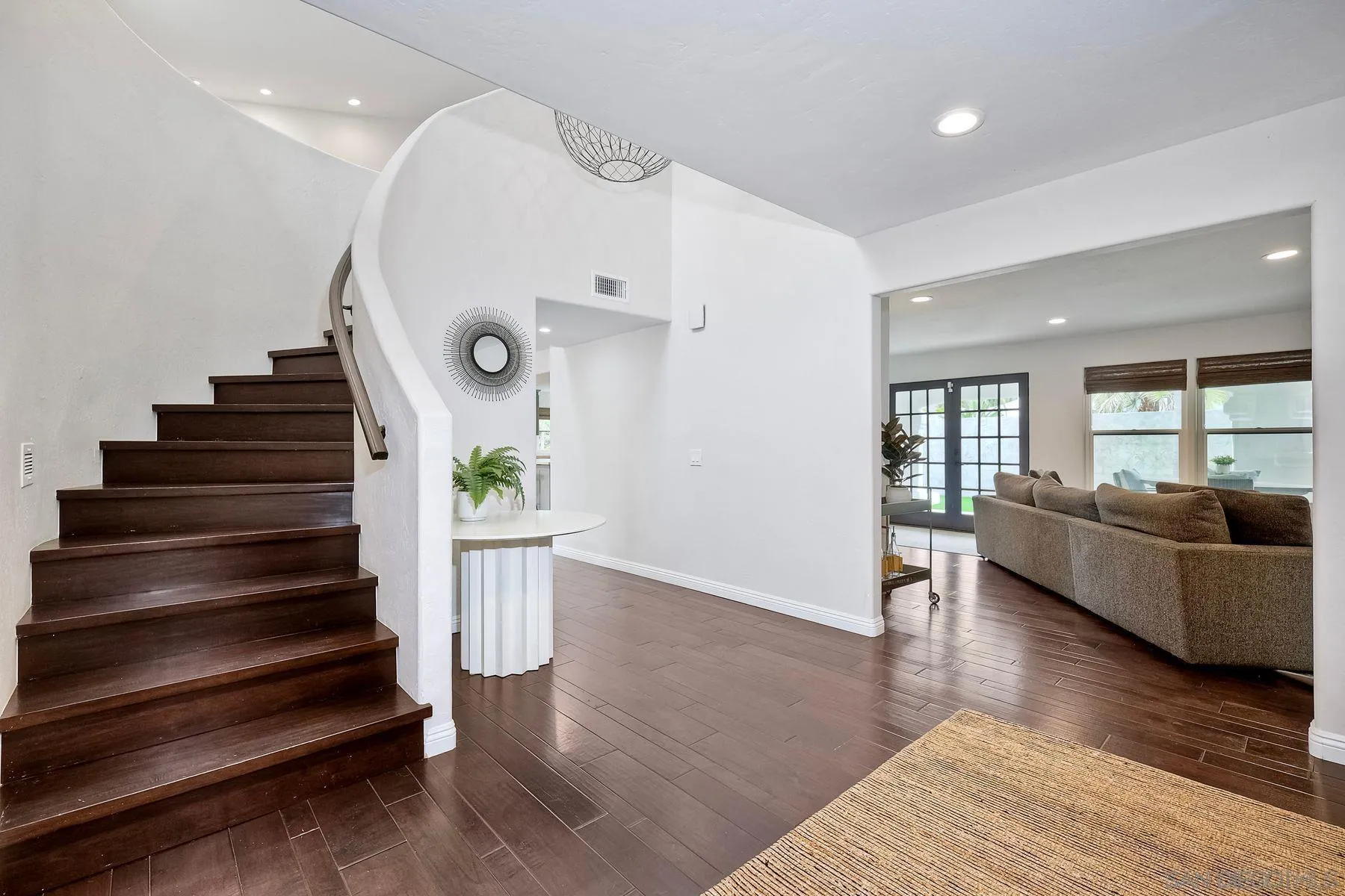 1408 Caudor Street Encinitas, CA 92024 - Photo 15 of 75 a living room with furniture and wooden floor