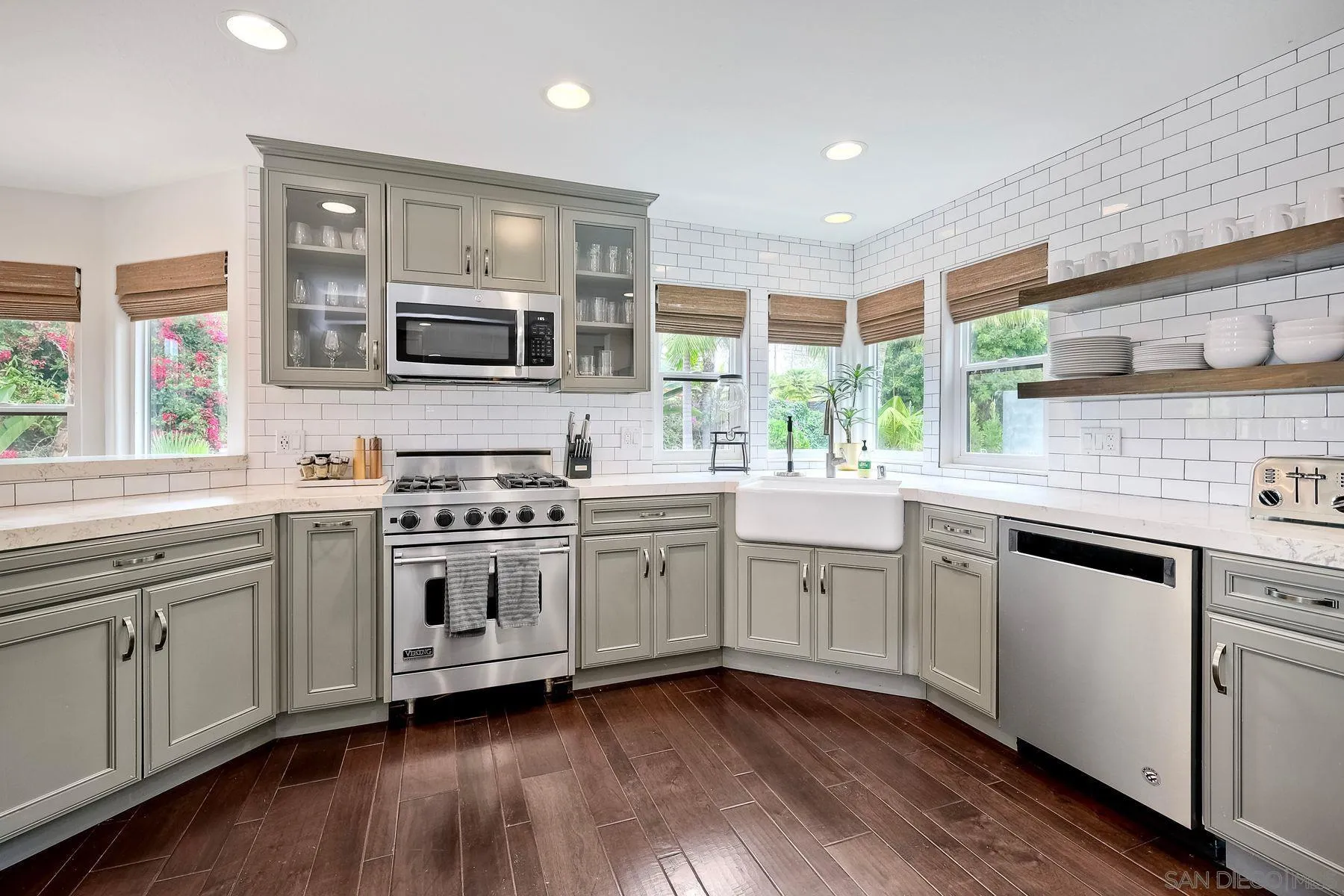 1408 Caudor Street Encinitas, CA 92024 - Photo 17 of 75 a kitchen with a stove a sink and a microwave