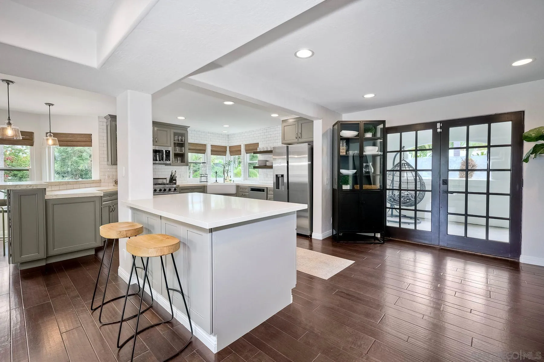 1408 Caudor Street Encinitas, CA 92024 - Photo 19 of 75 a kitchen with stainless steel appliances granite countertop a stove and a refrigerator