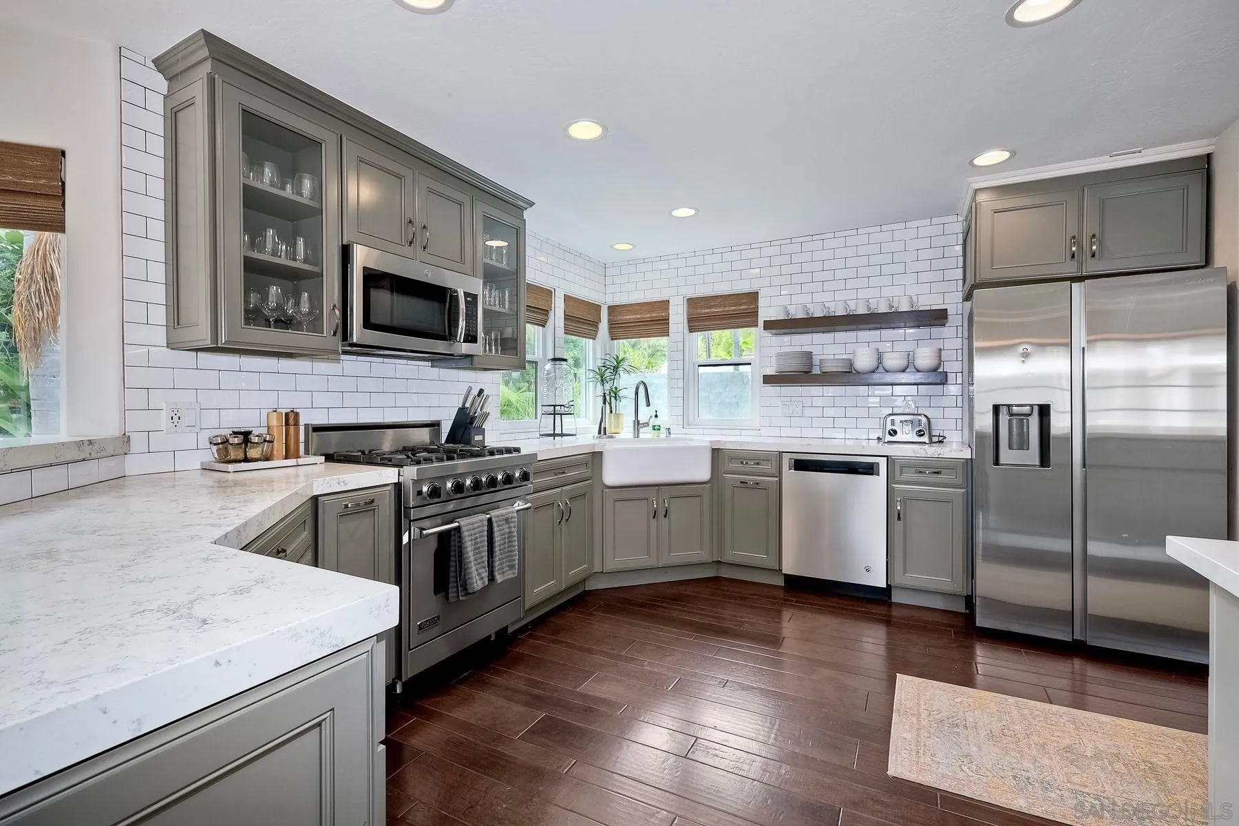 1408 Caudor Street Encinitas, CA 92024 - Photo 20 of 75 a kitchen with a sink cabinets and stainless steel appliances