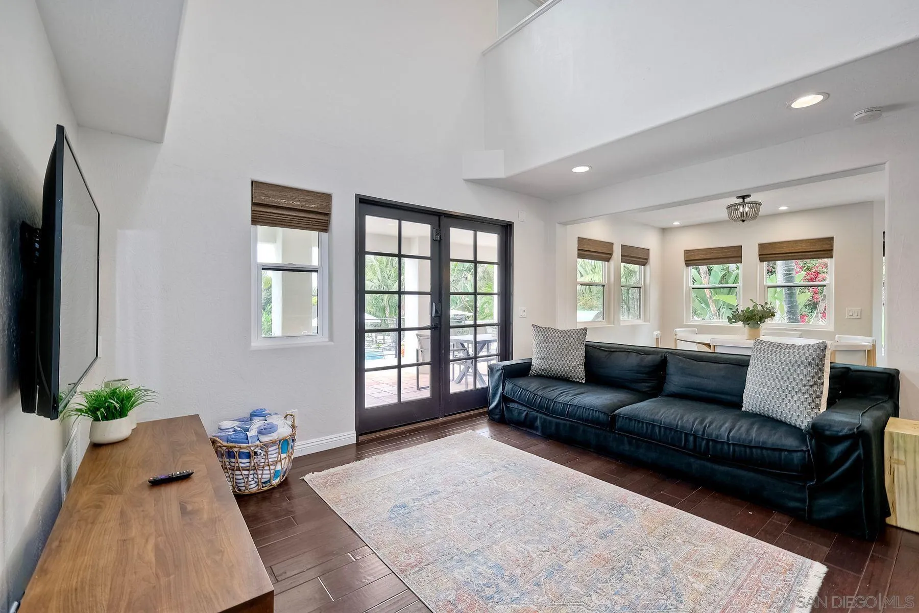 1408 Caudor Street Encinitas, CA 92024 - Photo 23 of 75 a living room with furniture and a flat screen tv