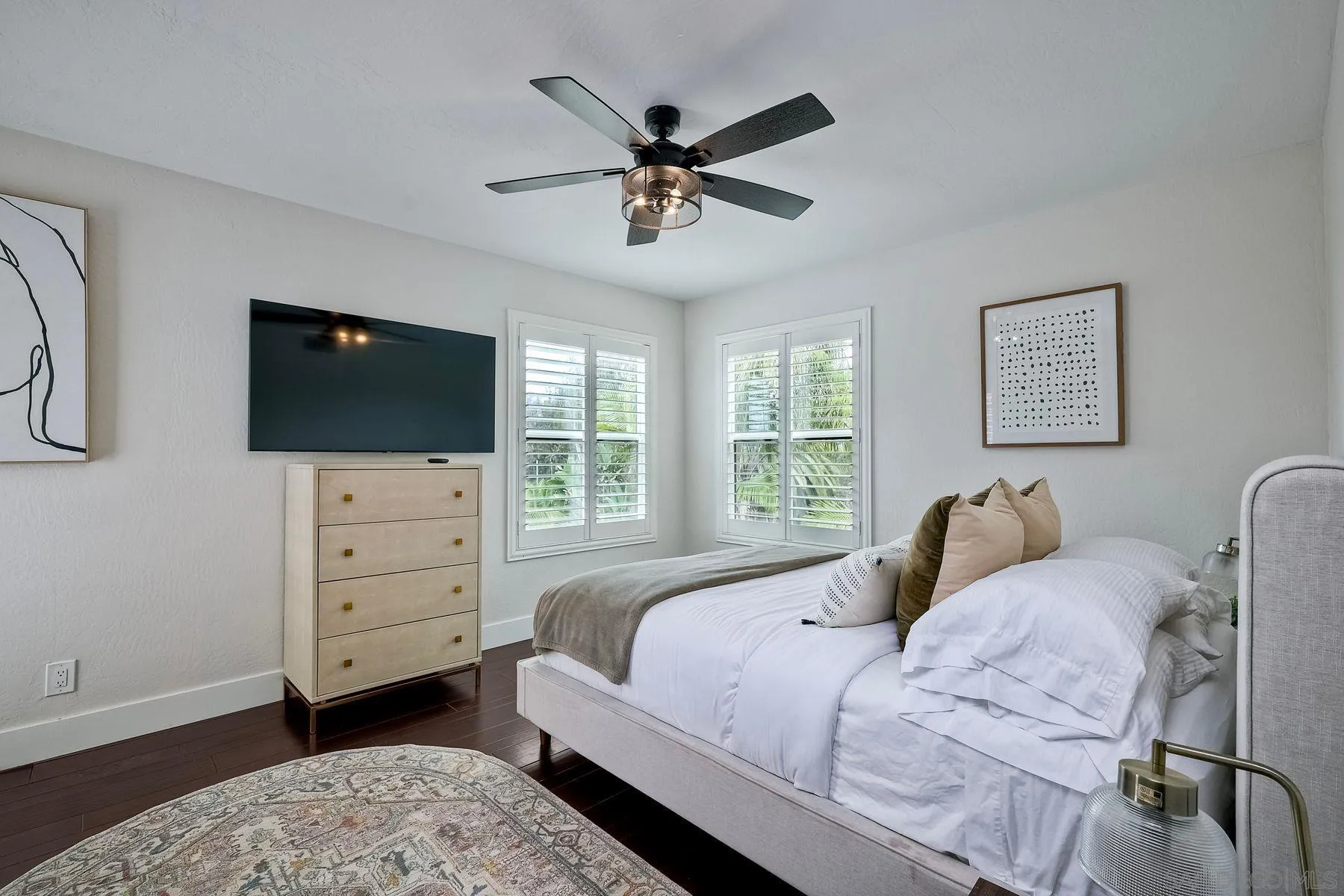 1408 Caudor Street Encinitas, CA 92024 - Photo 29 of 75 a bedroom with a bed flat screen tv and a window