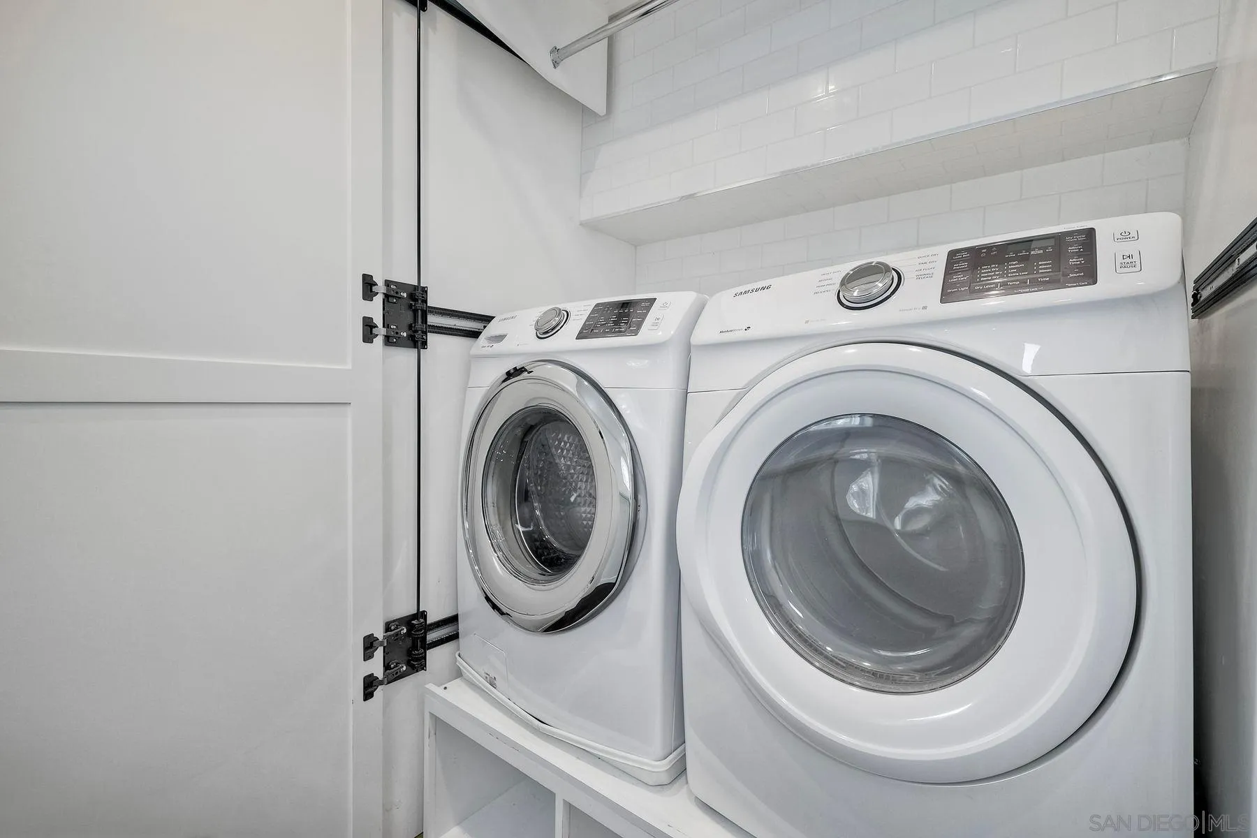1408 Caudor Street Encinitas, CA 92024 - Photo 30 of 75 a close up view of a washer and dryer