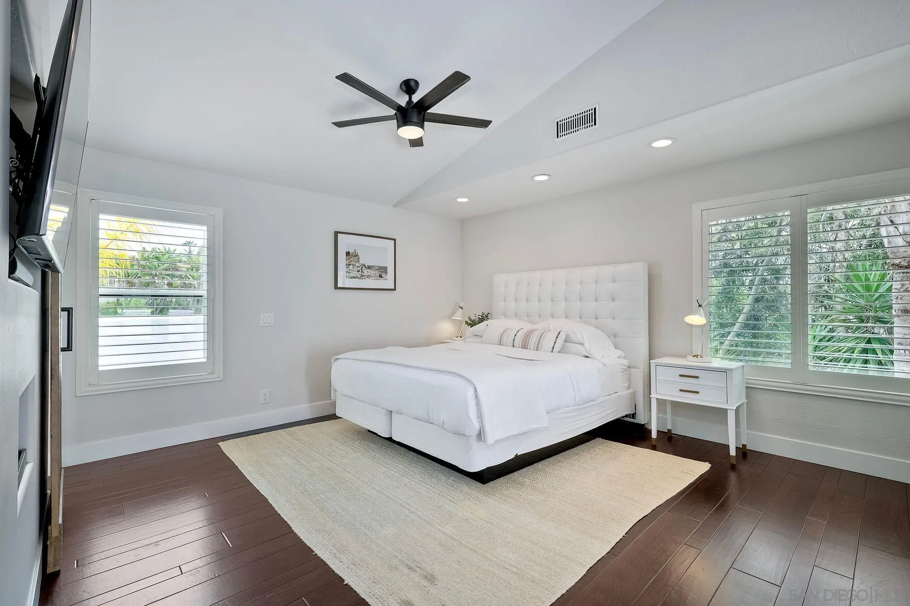 1408 Caudor Street Encinitas, CA 92024 - Photo 31 of 75 a bedroom with a large bed and a window