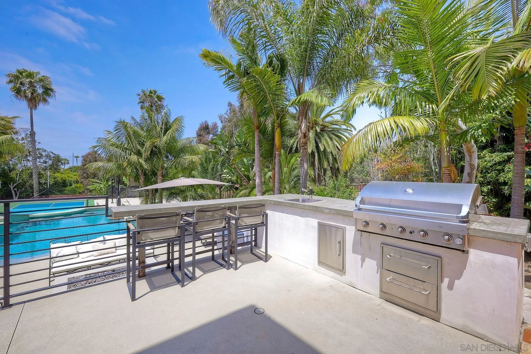 1408 Caudor Street Encinitas, CA 92024 - Photo 45 of 75 a view of a chairs and table in patio