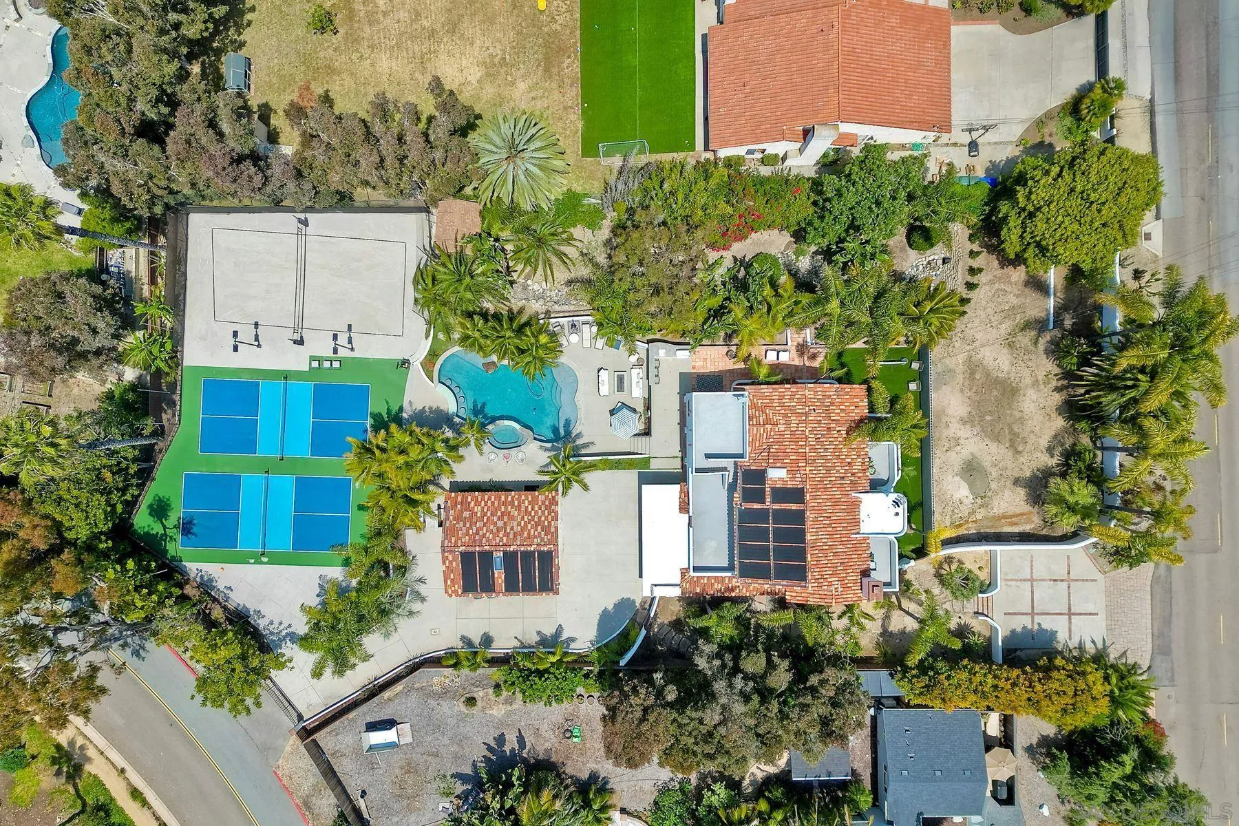 1408 Caudor Street Encinitas, CA 92024 - Photo 59 of 75 an aerial view of a house with a yard and garden