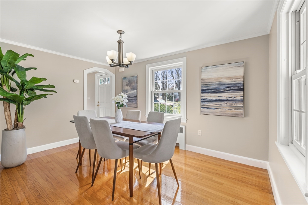 85 Blake Road Lexington, MA 02420 - Photo 17 of 42 a view of a dining room with furniture window and wooden floor