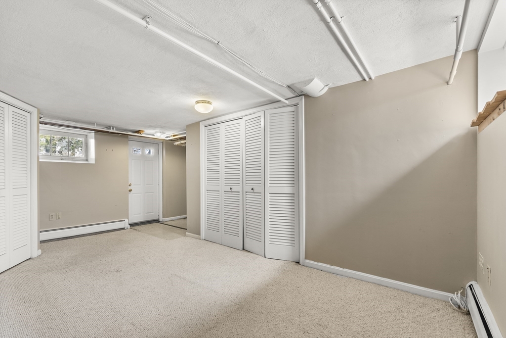 85 Blake Road Lexington, MA 02420 - Photo 34 of 42 an empty room with windows