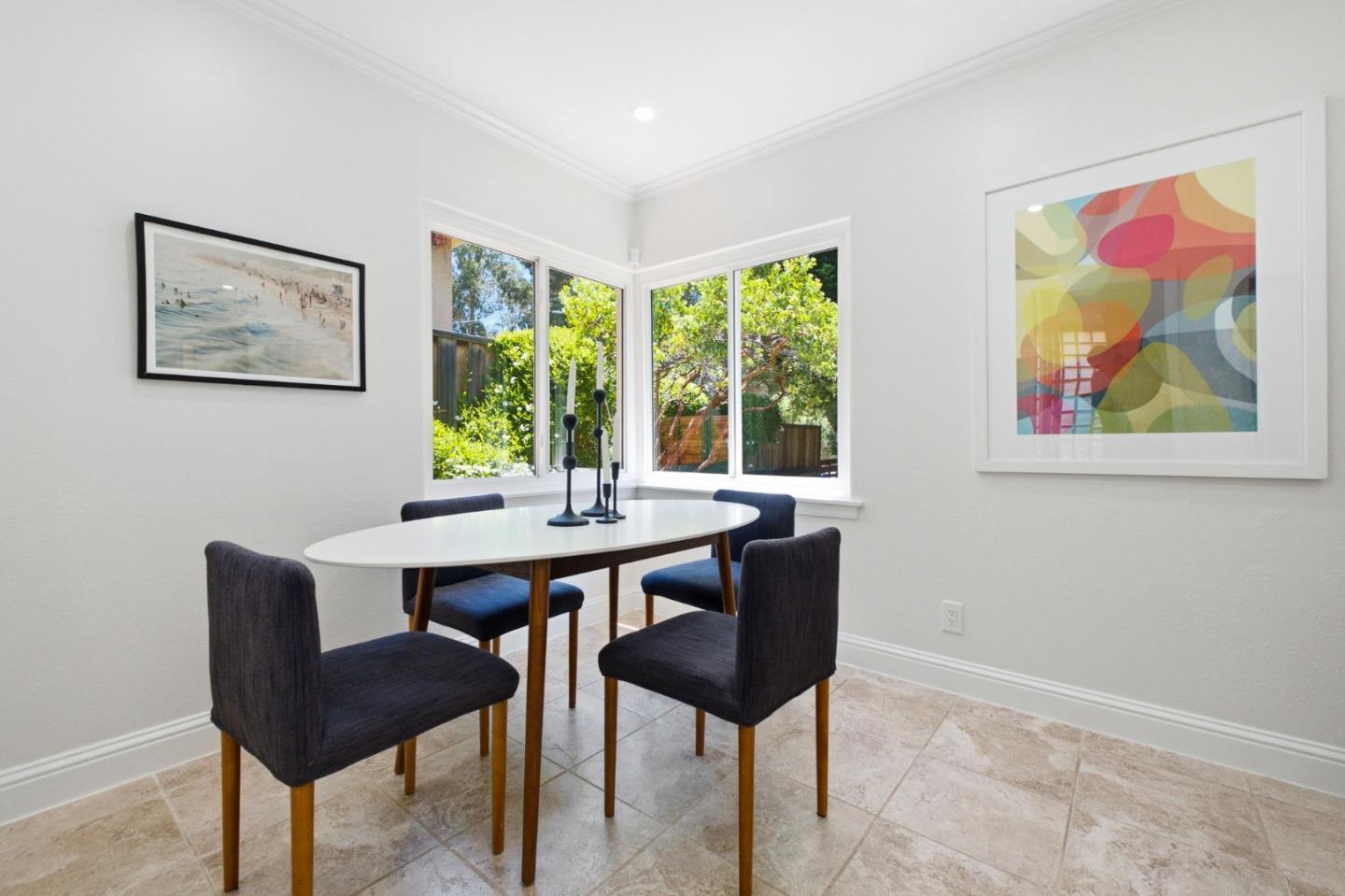 9858 Golf Links Road Oakland, CA 94605 - Photo 11 of 39 a view of a dining room with furniture window and outside view