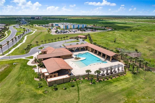 an aerial view of a house with a garden