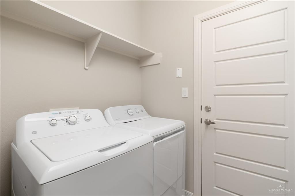 14325 Chalk Rdg Drive McAllen, TX 78504 - Photo 10 of 17 a utility room with dryer and washer