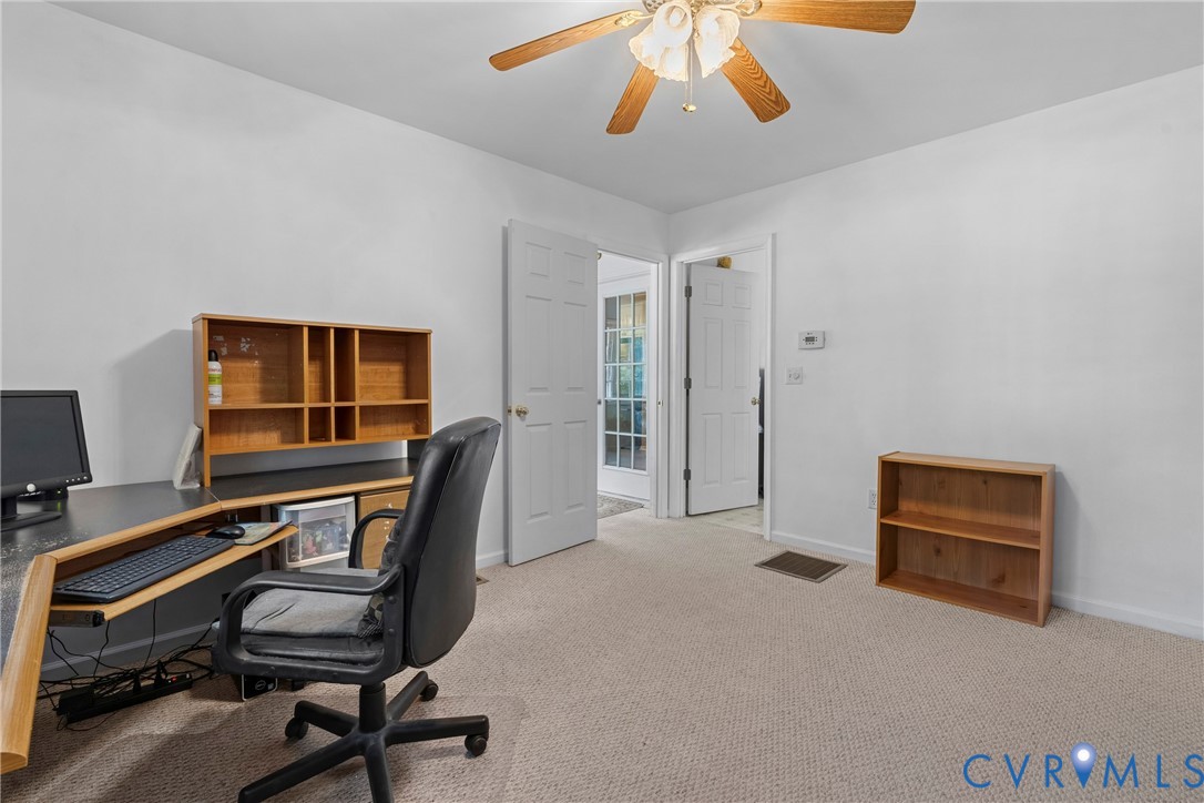 5010 Tatum Road Disputanta, VA 23842 - Photo 24 of 50 Carpeted room with white walls, a ceiling fan with