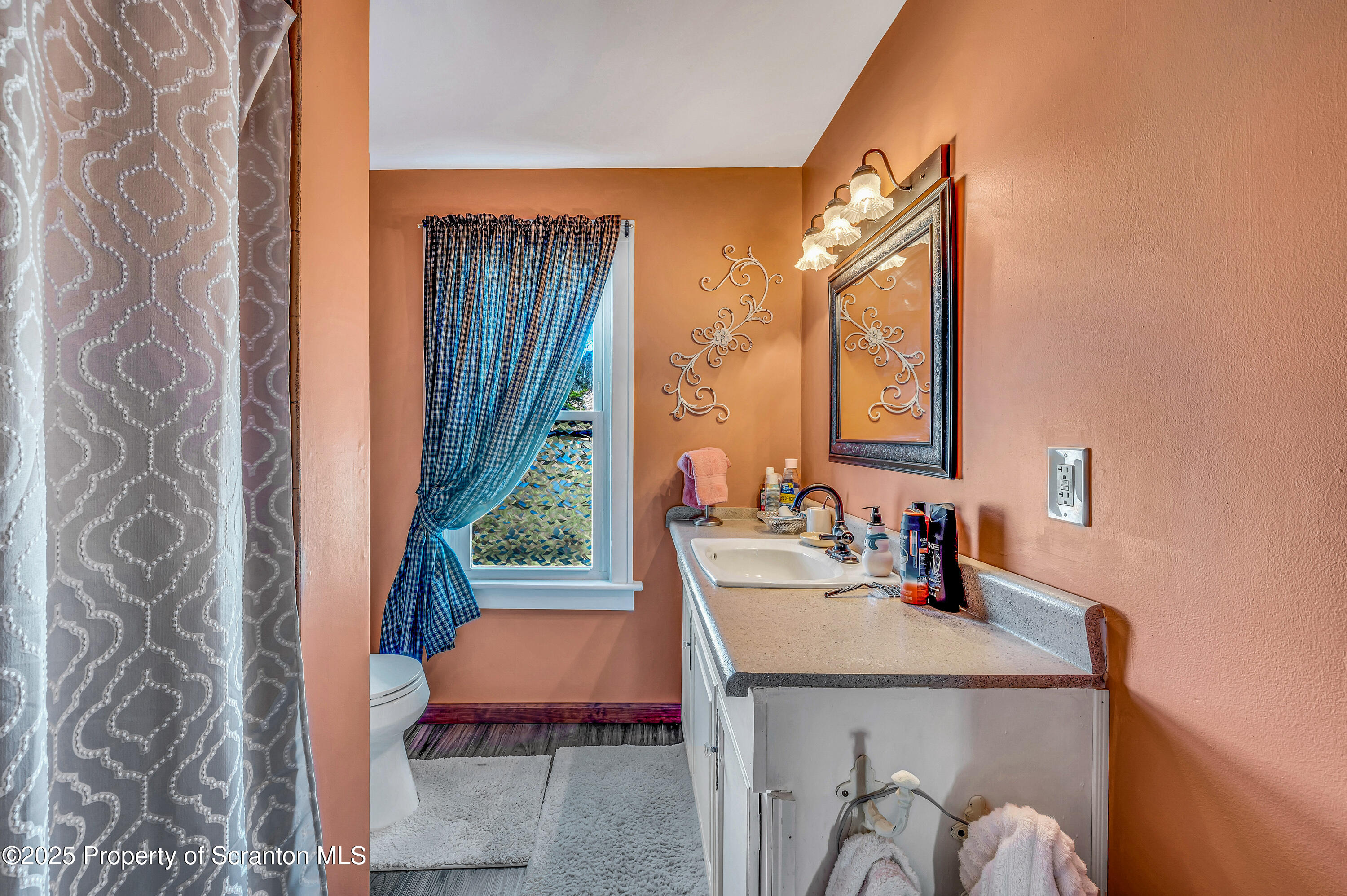 5115 State Rte 3013 Springville, PA 18844 - Photo 65 of 74 a bathroom with a sink vanity and a mirror