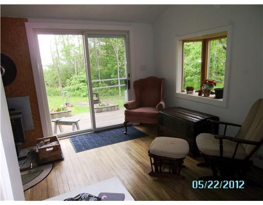 1078 River Road Tenants Harbor, ME 04860 - Photo 11 of 13 Den/Family/Great Room. Sliders to...
