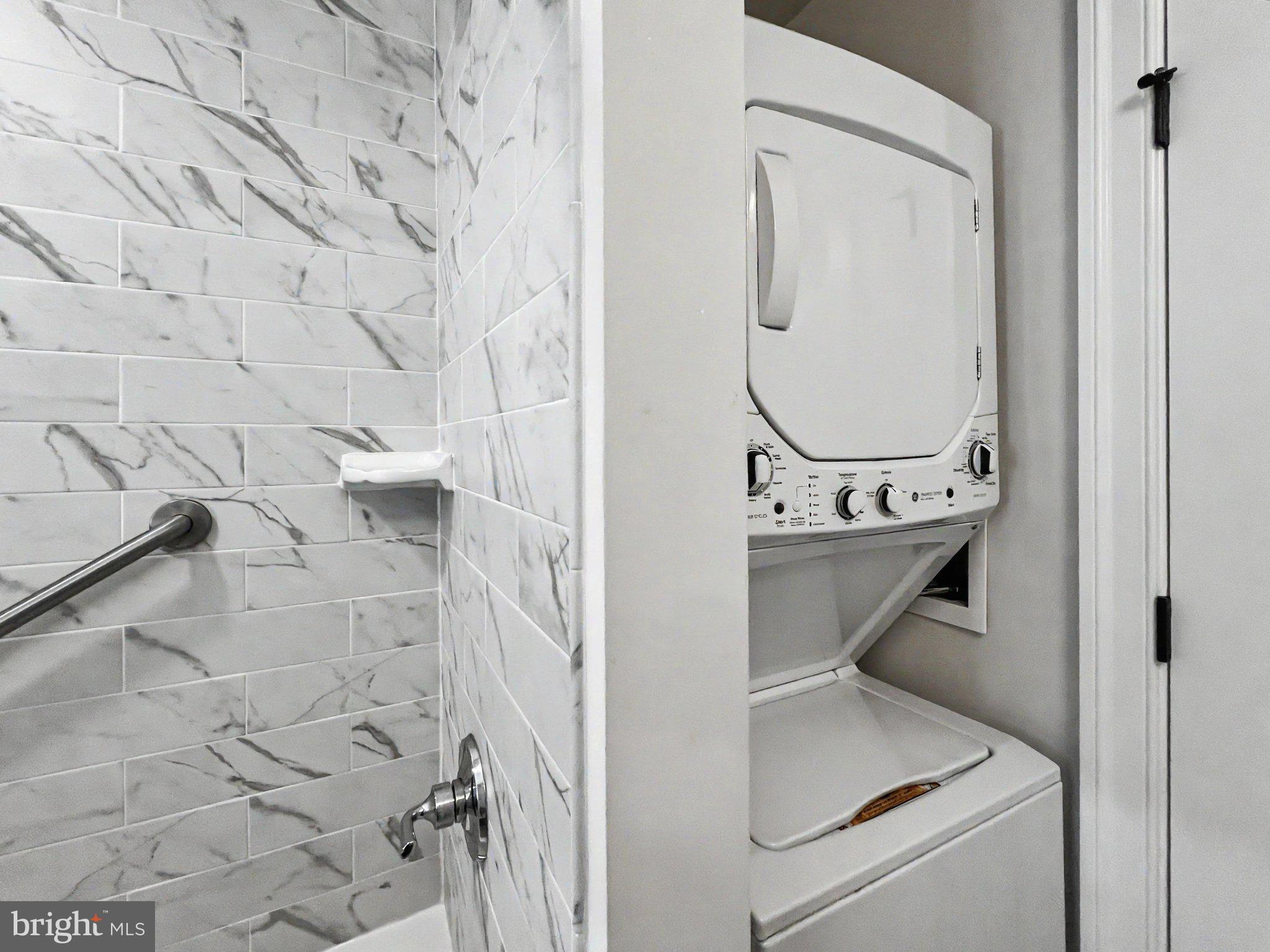 1 Pennsylvania Avenue, Unit 1 Wayne, PA 19087 - Photo 18 of 22 a bathroom with a sink and mirror
