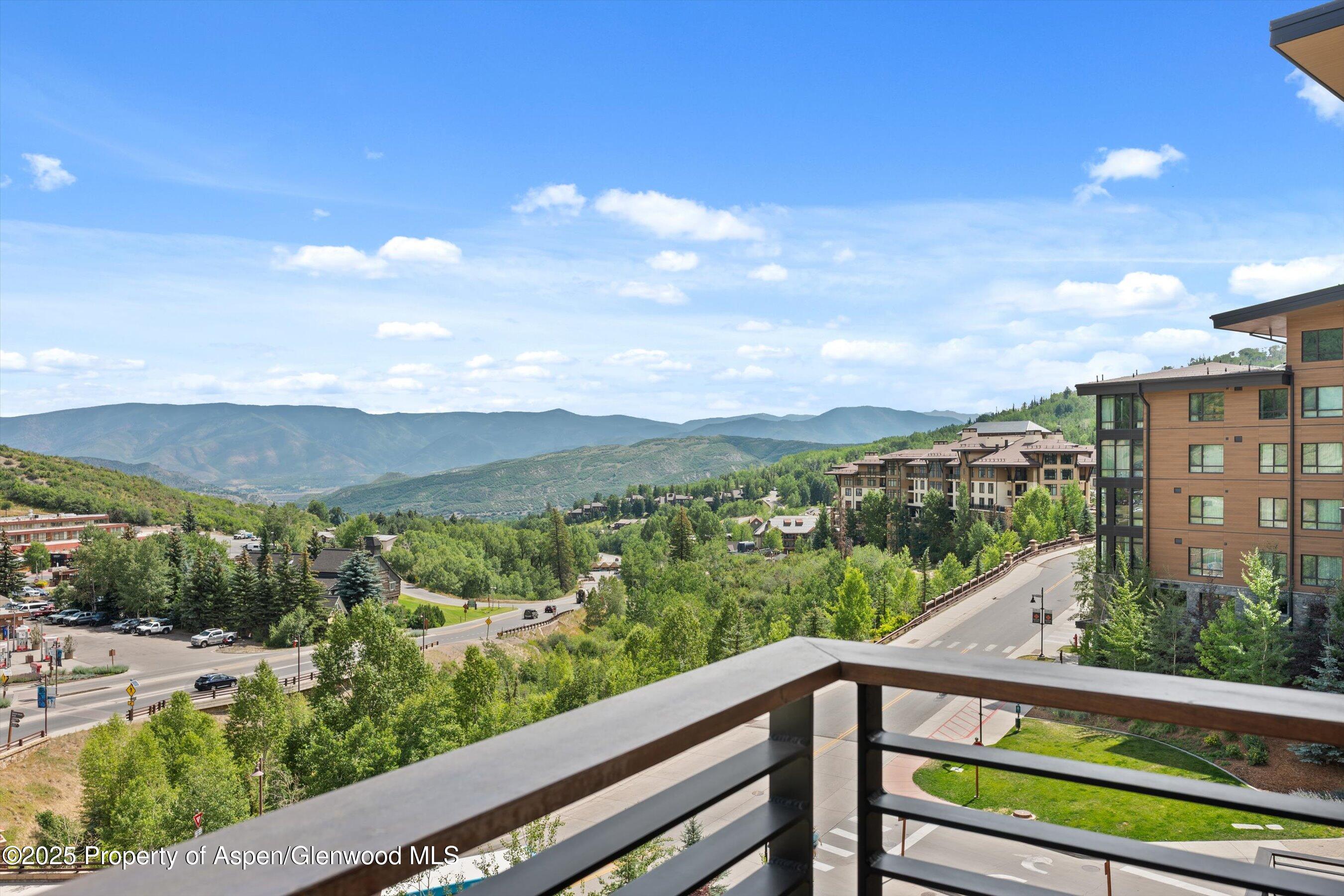 45 Wood Road, Unit 501 Snowmass Village, CO 81615 - Photo 10 of 44 a view of a city from a balcony
